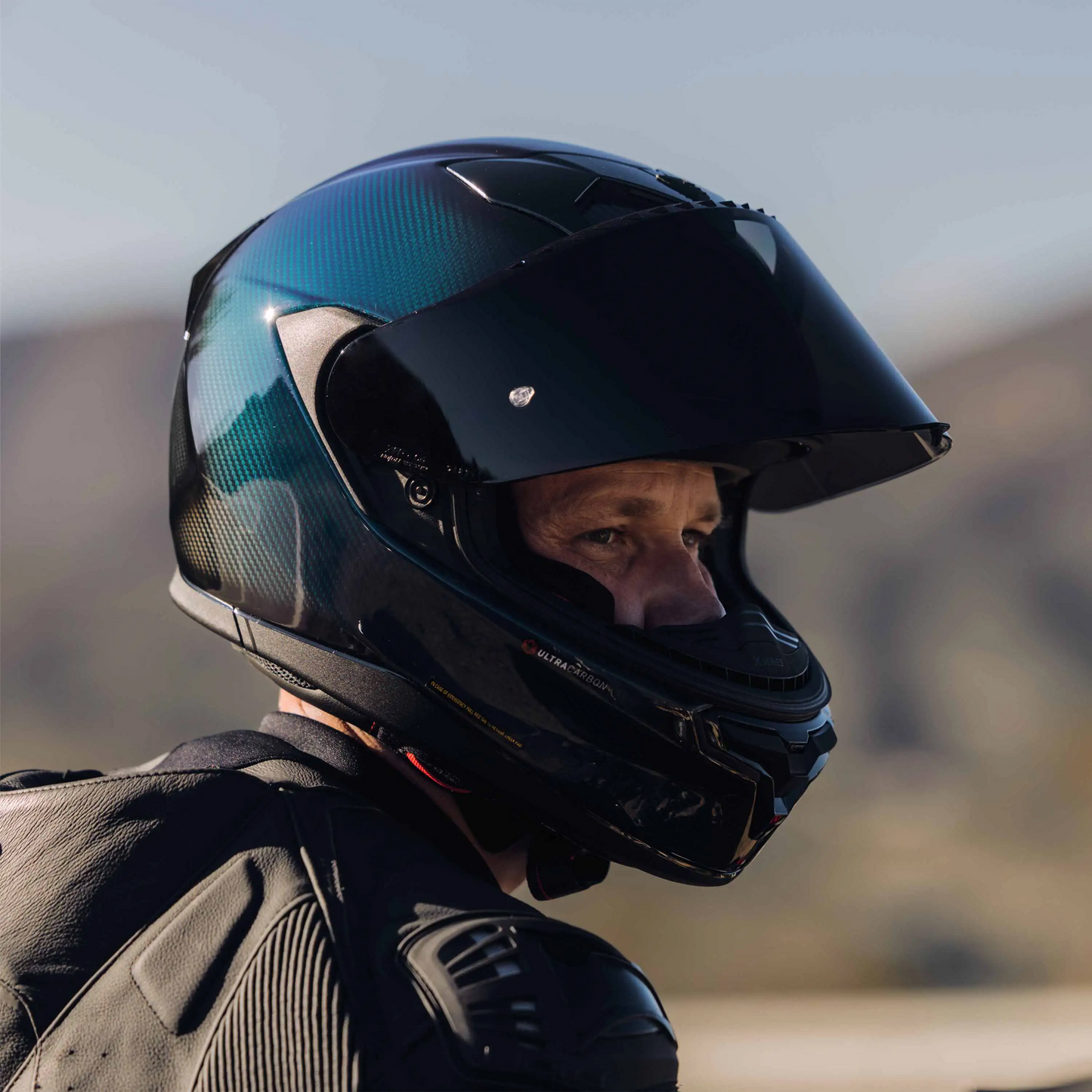 X-904 ULTRA CARBON PURO I-ESS Nero – Nolan Helmets